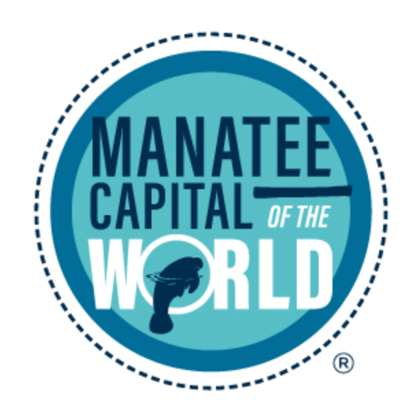 Blue logo with text: 'Manatee Capital of the World' and a silhouetted manatee.